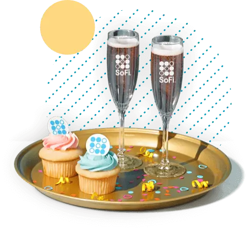 A serving tray with champagne glasses and a gold bell